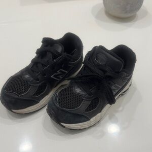 New Balance Kids Black and White Sneakers